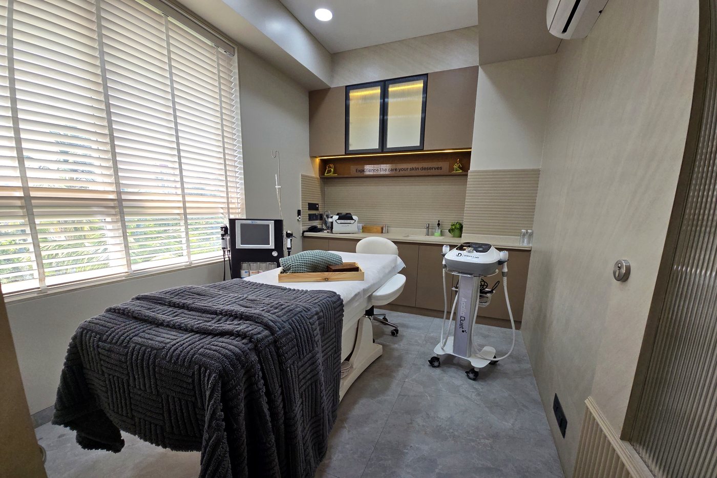 Apollo Duet RF machine and touchscreen protocol console in the Eternis Clinic medifacial suite
